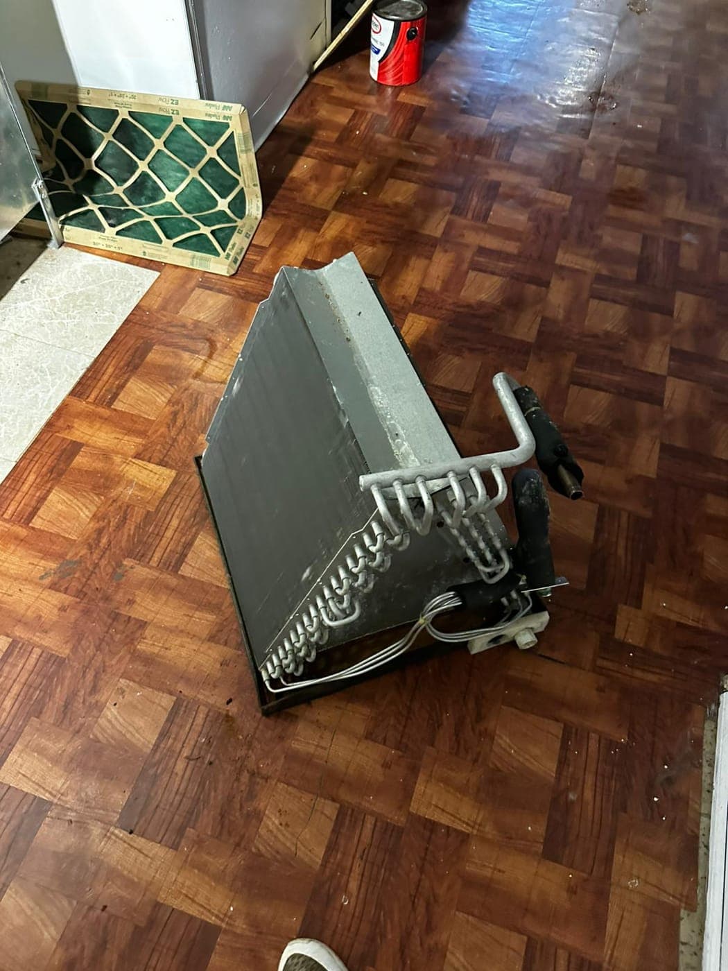 Evaporator coil and ductwork connection at an indoor air handler