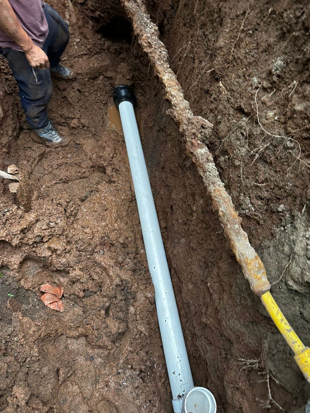 New PVC sewer line in an open trench